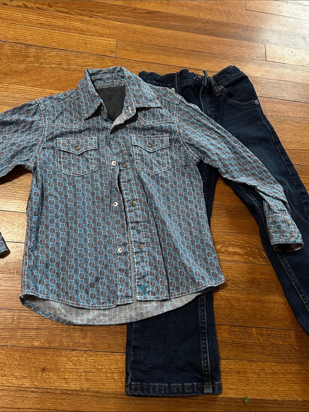 Kids Small Wrangler 20X long sleeve pearl snap with a pair of denim 20x Wrangler